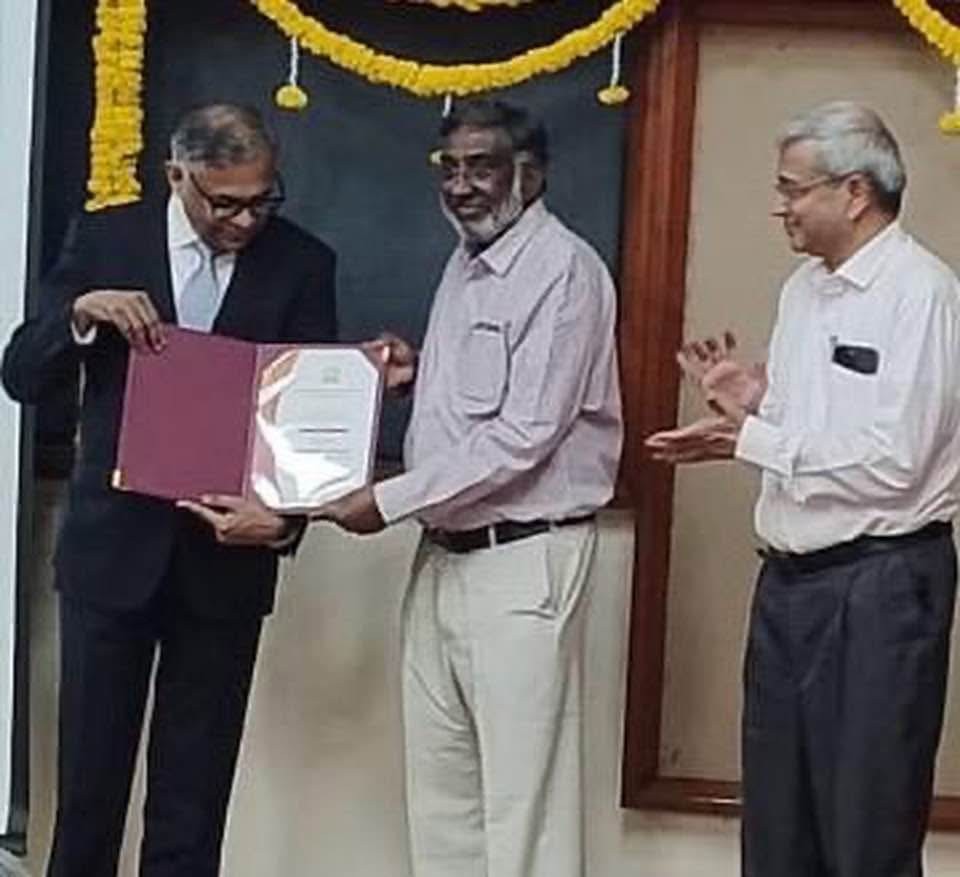 Receiving from  N Chandrashekar - TATA CEO - Research Excellence Award by IISc